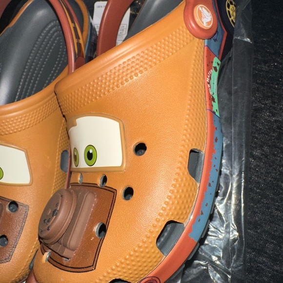 CROCS Brown Slippers with Playful Character Design main image 4